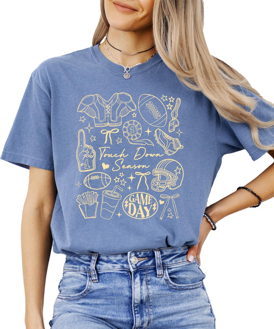 Touch Down Season football collage graphic tee on woman in ivory color