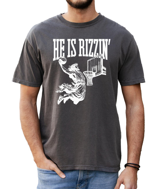 Front view of He Is Rizzin' Gen Z Jesus basketball tee on adult model
