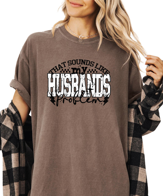 Close-up of That Sounds Like My Husband's Problem text design on women's t-shirt