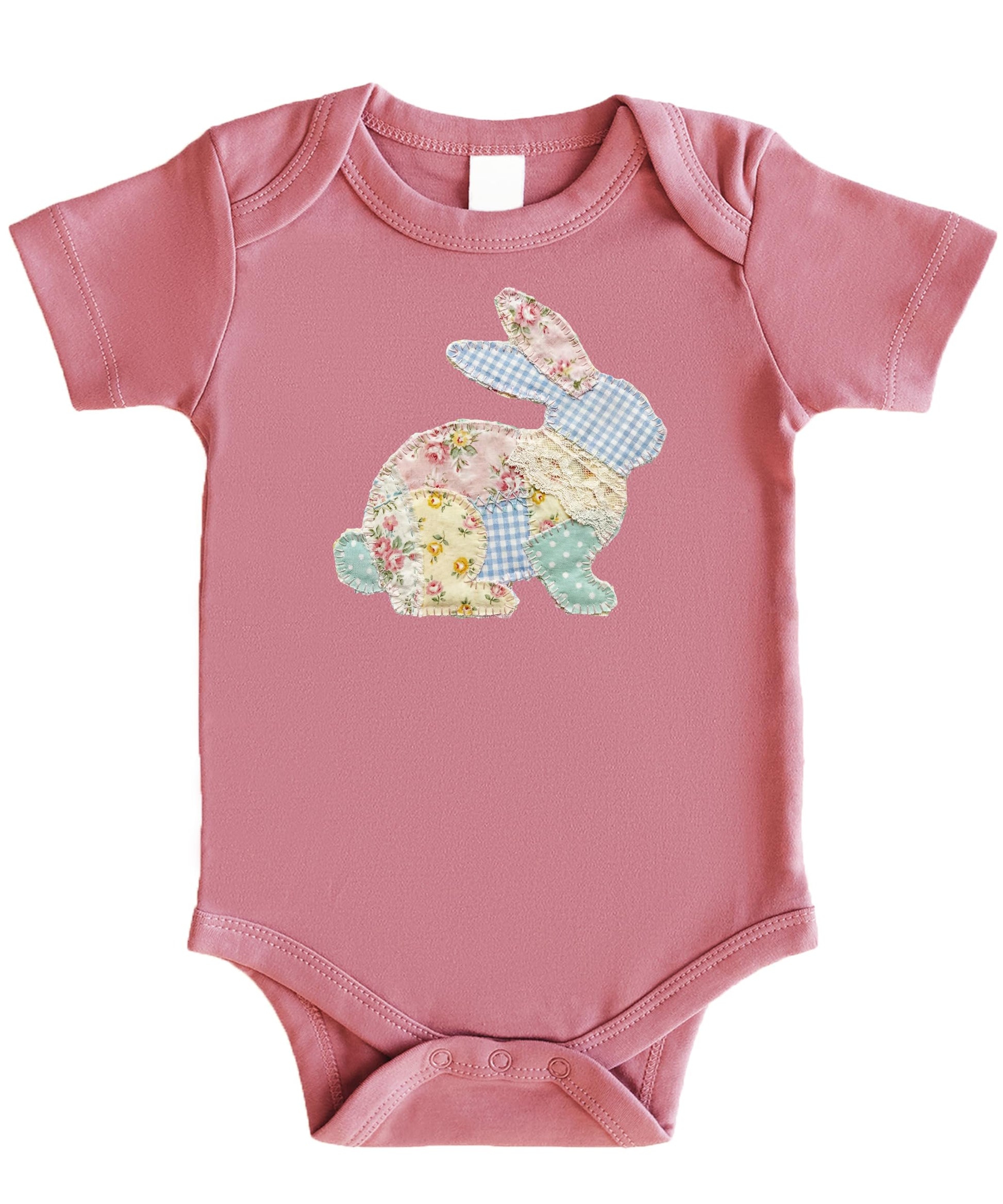 Close-up of faux quilted patchwork bunny graphic printed on baby bodysuit