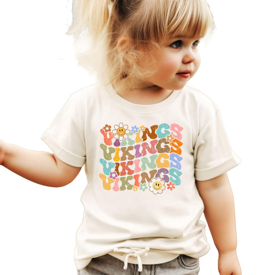 Vikings graphic tee modeled showing fit and design details with rainbow colored text