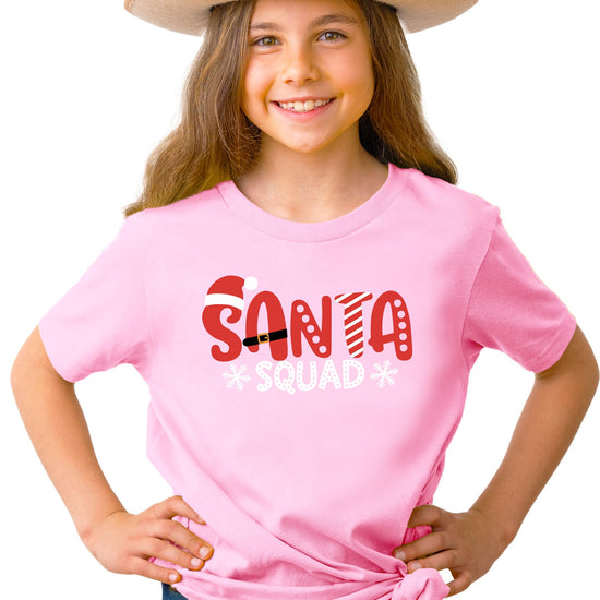 Toddler wearing Santa Squad mauve Christmas tee as part of matching family holiday outfit