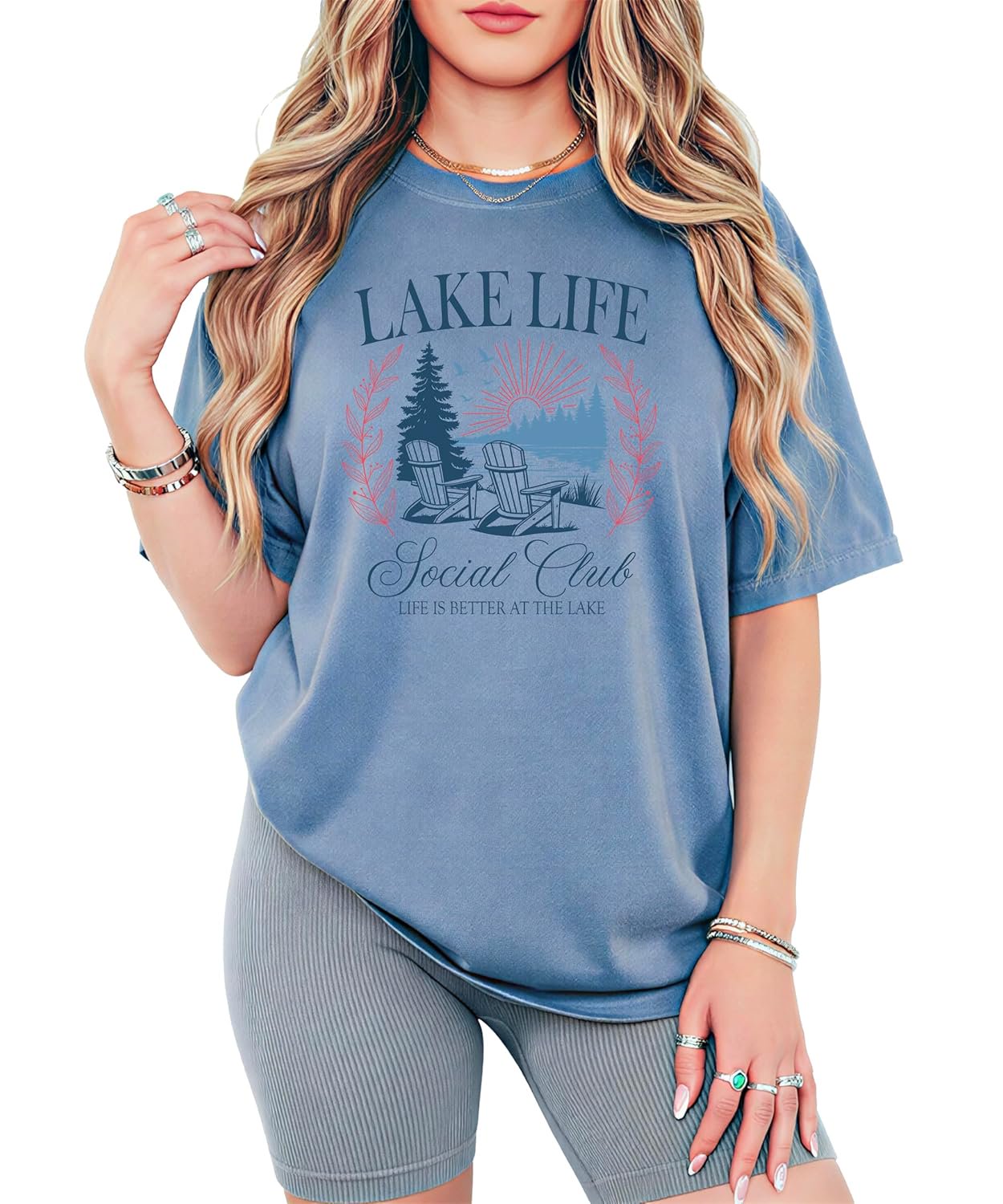 Lake Life Social Club ivory graphic tee with vintage lakeside scene featuring Adirondack chairs and pine trees