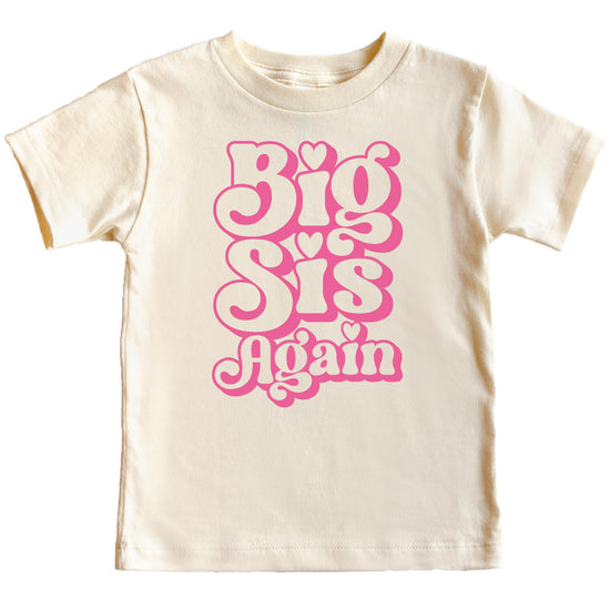 Big Sister Again youth tee laid flat showing full retro pink graphic design
