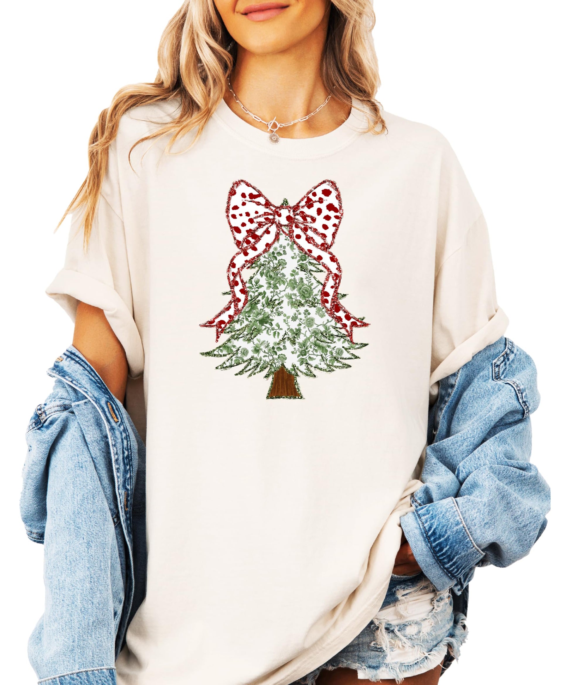 Full-length view of women's holiday graphic tee with faux glitter floral Christmas tree and red bow