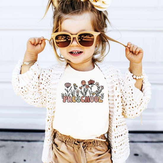 Lifestyle or detail shot of boho wildflower preschool shirt for toddlers and kids