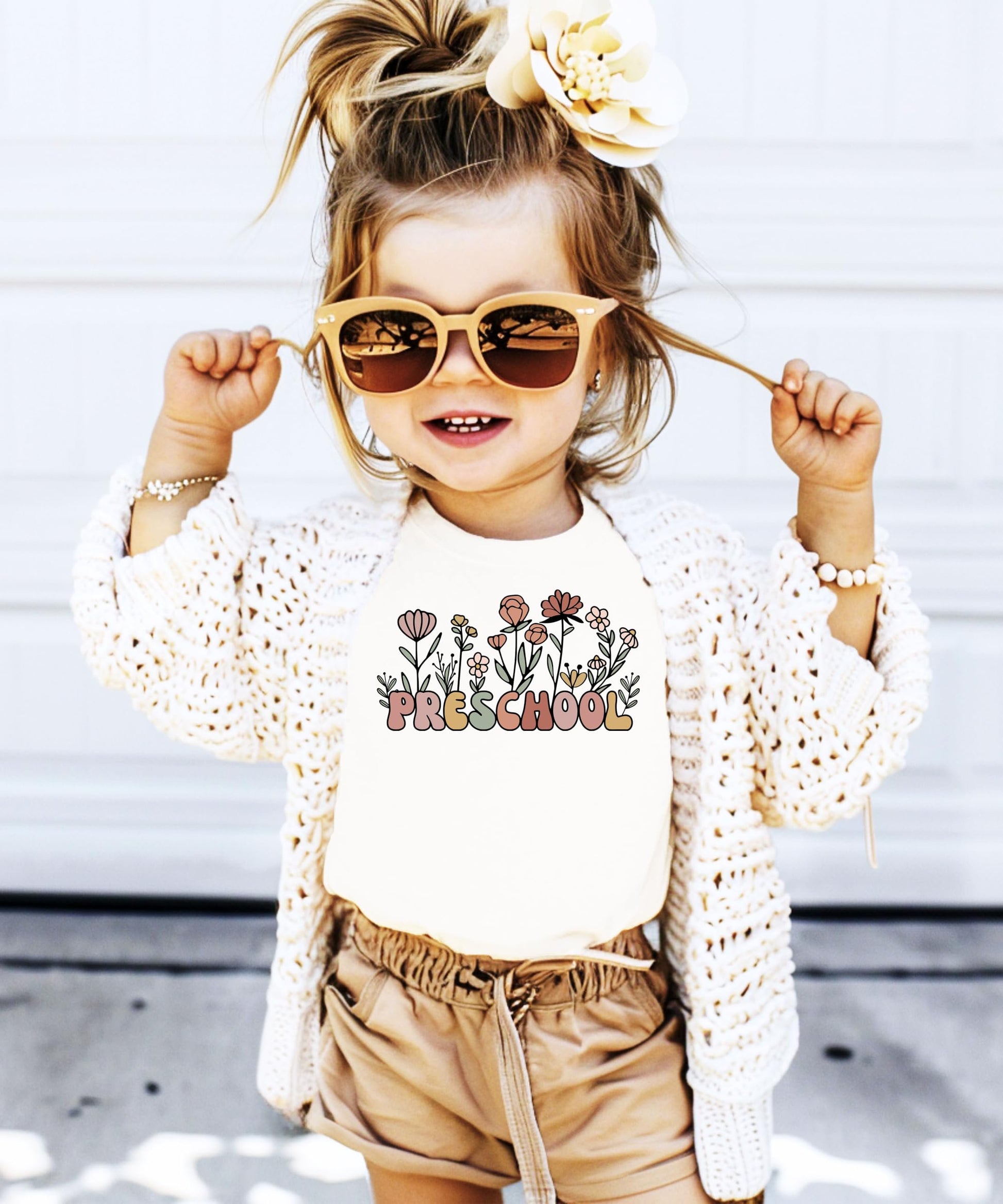 Lifestyle or detail shot of boho wildflower preschool shirt for toddlers and kids