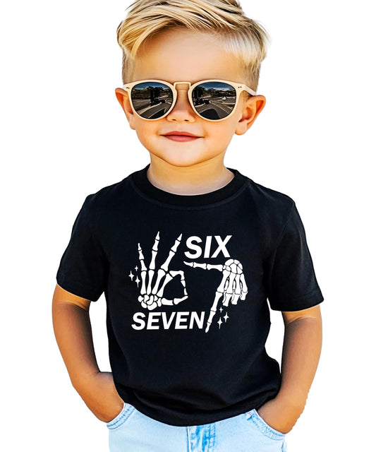 Black t-shirt with white skeleton hand showing six seven finger gesture Halloween meme design