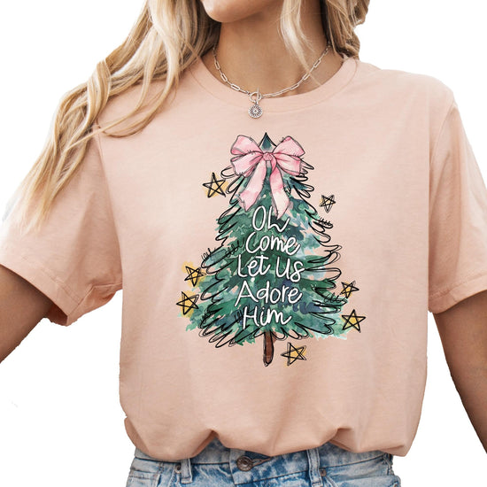 Close-up of professional print quality on pink Christmas graphic tee for girls