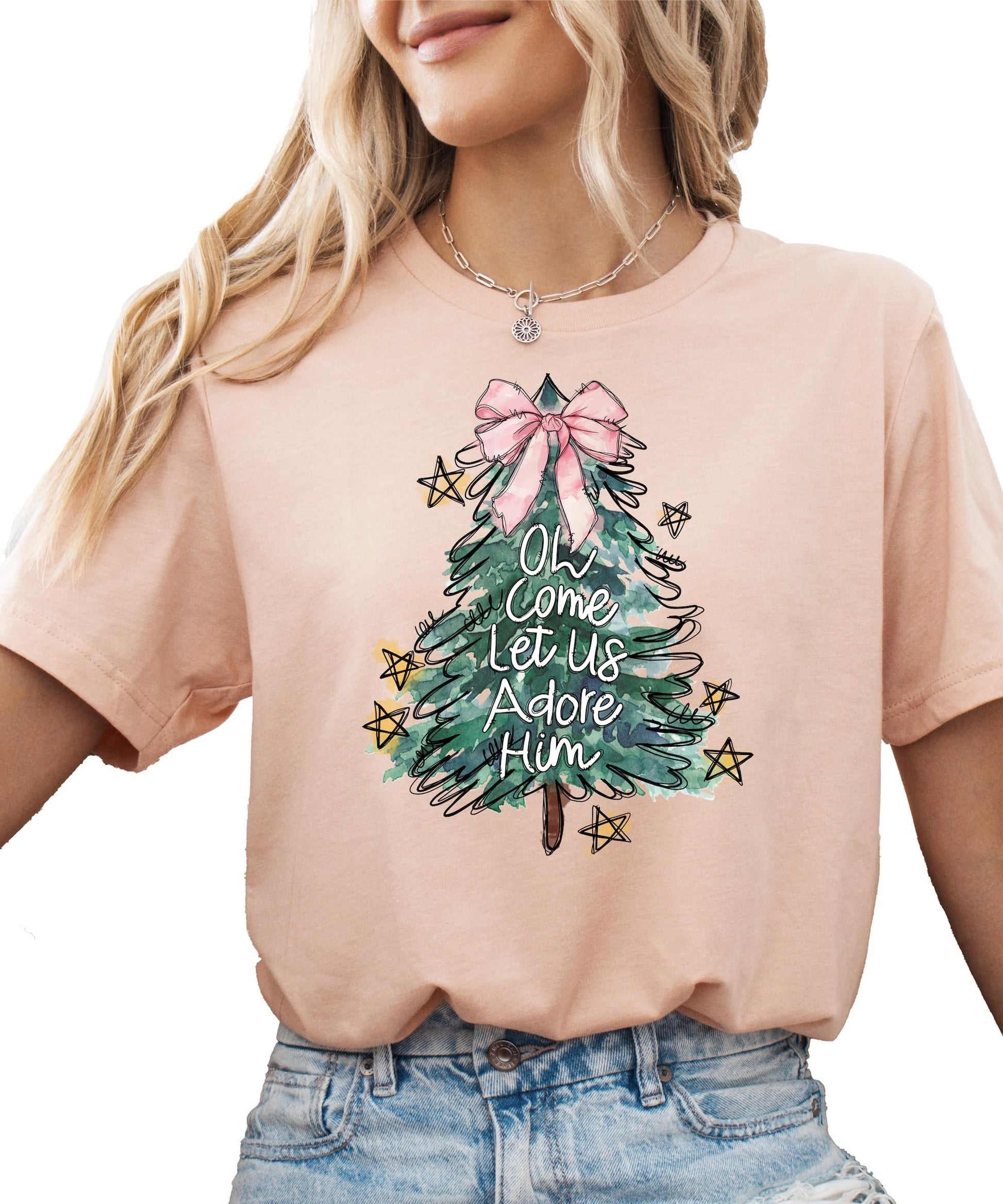 Close-up of professional print quality on pink Christmas graphic tee for girls
