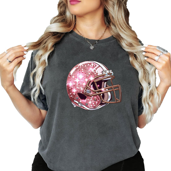 Detail shot of faux glitter pink football helmet print on women's oversized tee