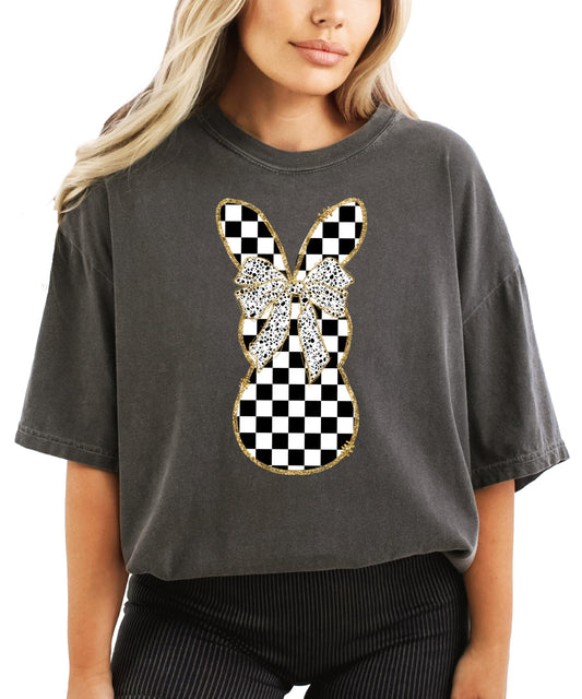 Black and white checkered bunny graphic tee on woman, retro Easter design