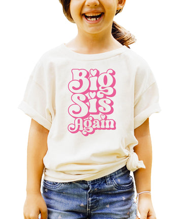 Kids natural tee with groovy pink 'Big Sis Again' retro graphic and heart details