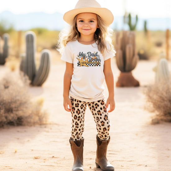 Kids wearing My Dad Rocks peach graphic tee — fun Father's Day outfit for boys and girls
