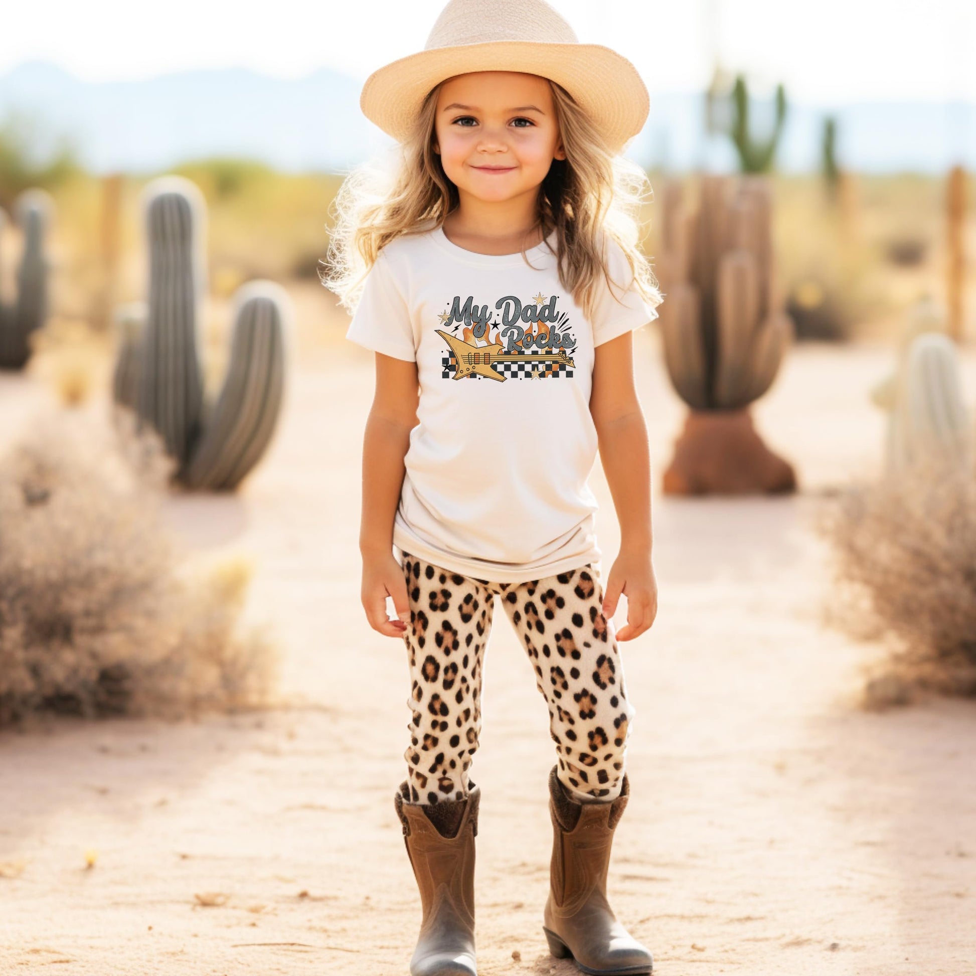 Kids wearing My Dad Rocks peach graphic tee — fun Father's Day outfit for boys and girls
