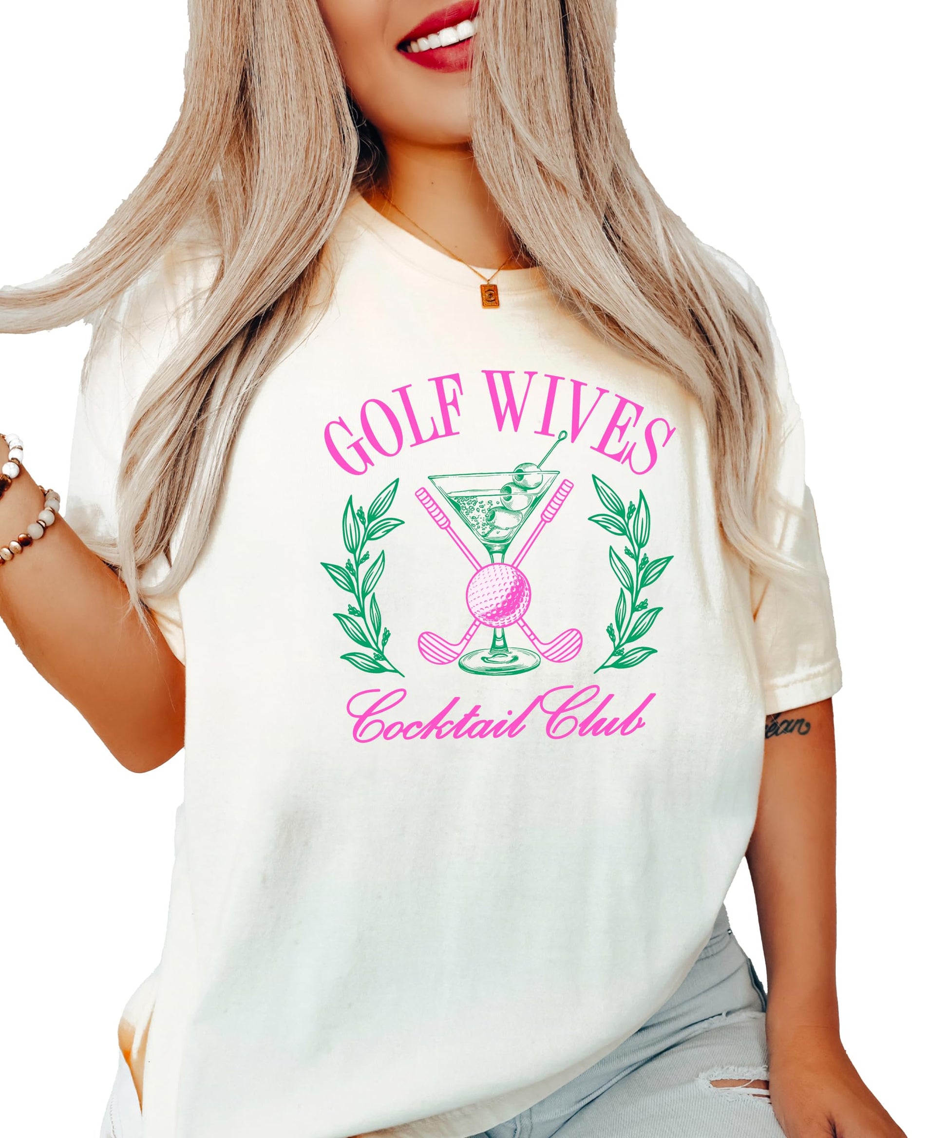 Front view of Golf Wives Cocktail Club women's graphic tee in ivory with bold cocktail and golf club design