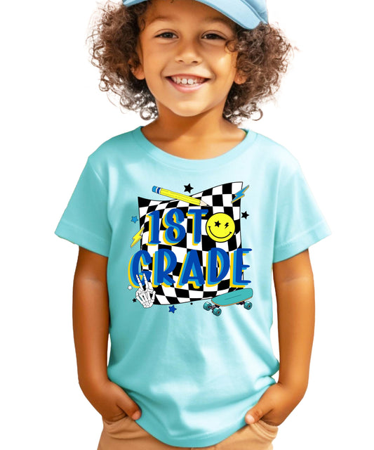 Boys retro 1st grade skateboard graphic tee from Olive Loves Apple, perfect for first day of school
