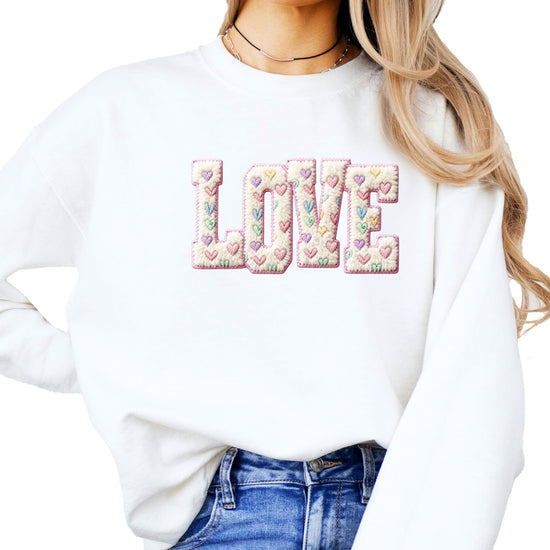 Girly retro pink pullover sweatshirt with ink-printed LOVE graphic and pastel heart details