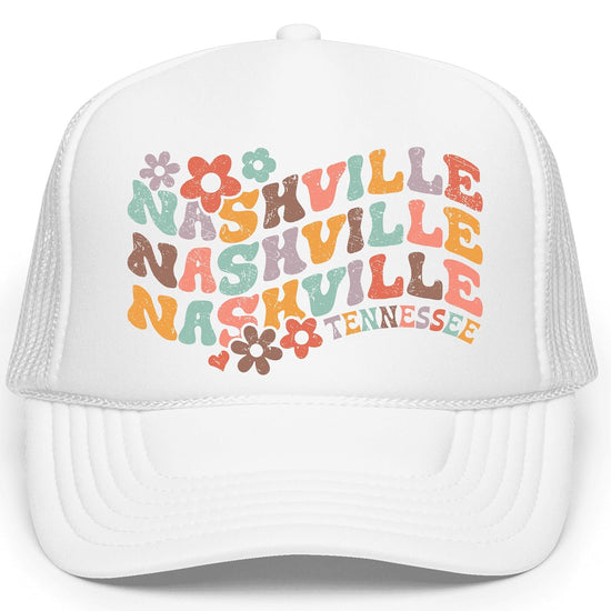 Close-up of groovy wavy Nashville lettering with multicolor floral design on structured foam trucker hat
