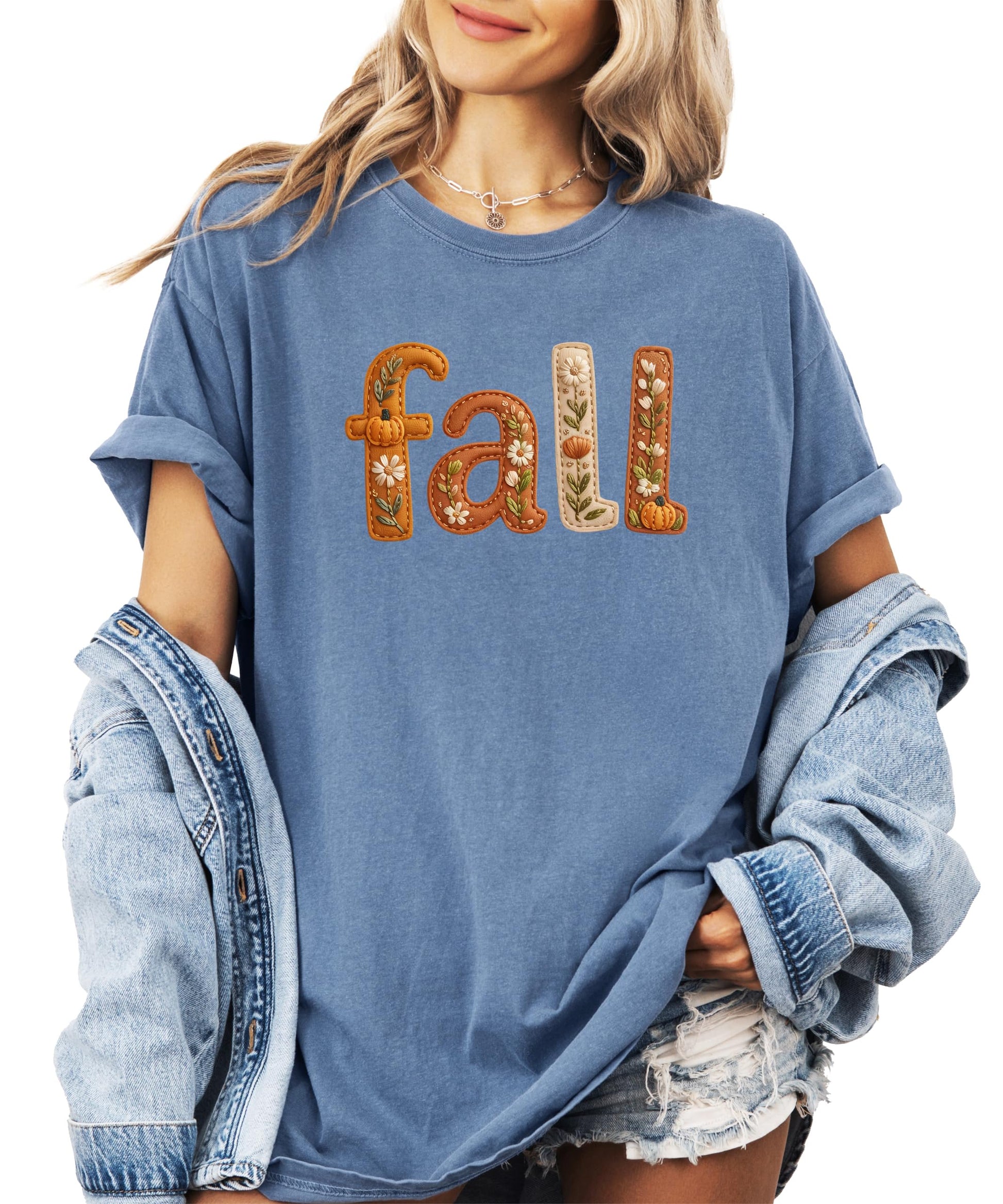 Women's fall tee flat lay showing full autumn graphic design