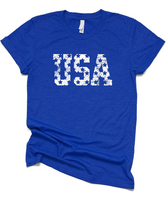 Close-up of vintage USA patriotic shirt showing distressed stars and text detail