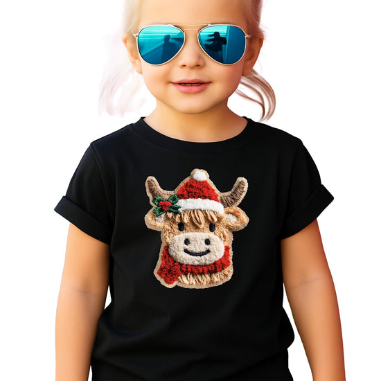 Kids vintage red Christmas tee with ink-printed faux yarn cow wearing a Santa hat and scarf