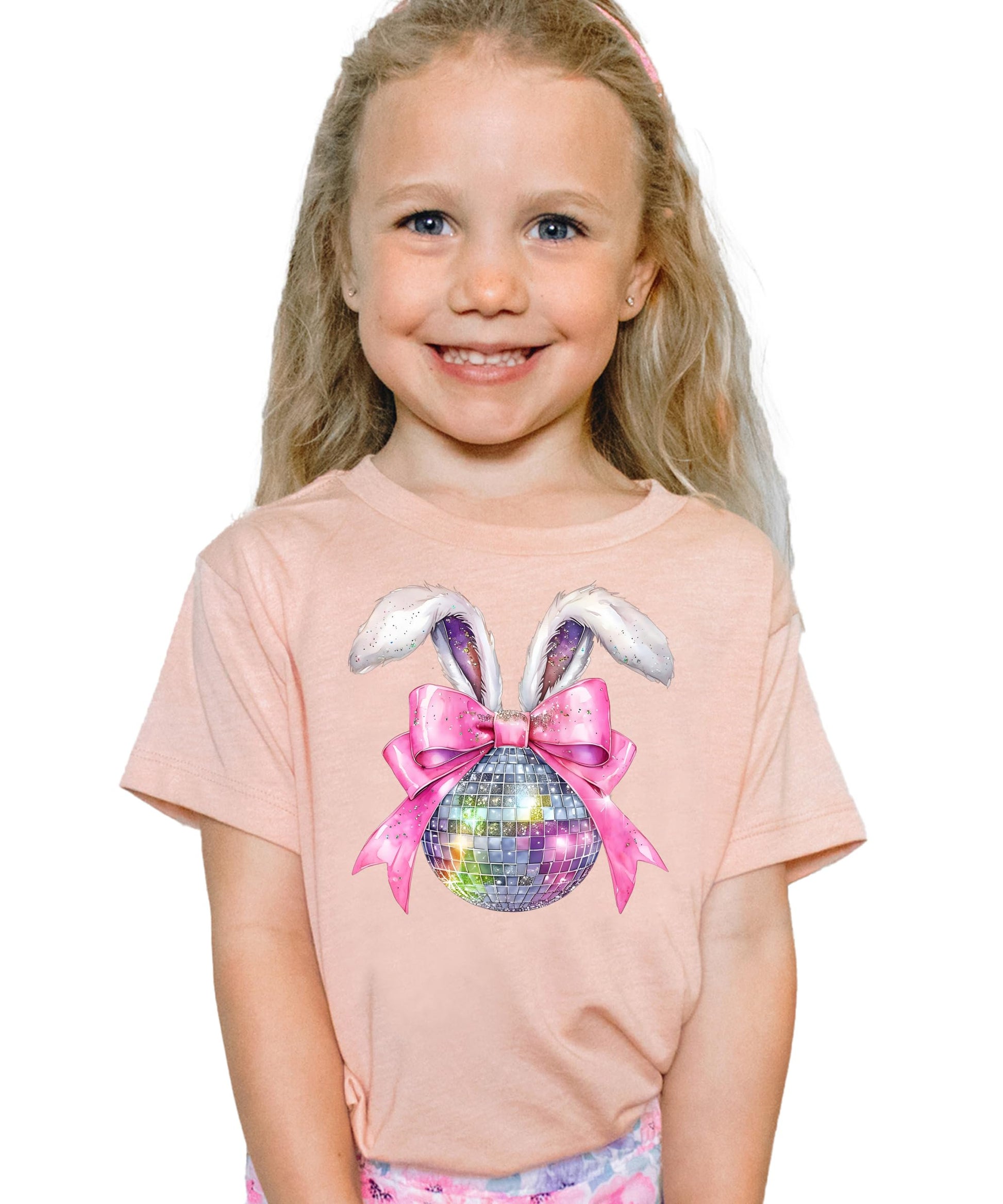 Youth girl modeling pink disco bunny Easter tee with coquette bow graphic print