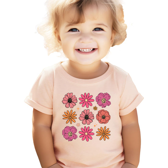 Back or side view of colorful kids floral graphic tee for girls and toddlers