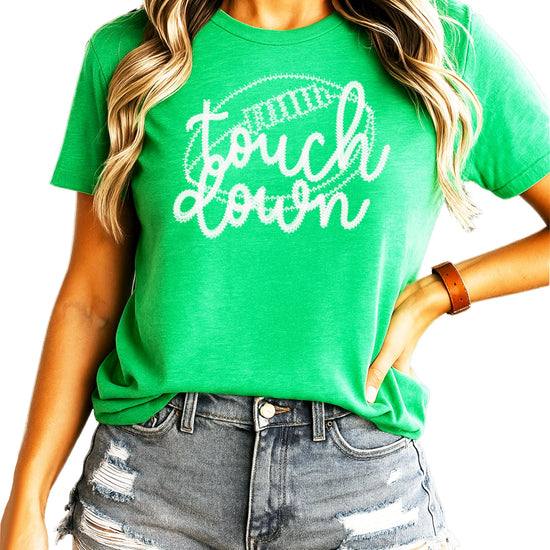Detail view of vintage-style touchdown embroidery design on women's shirt