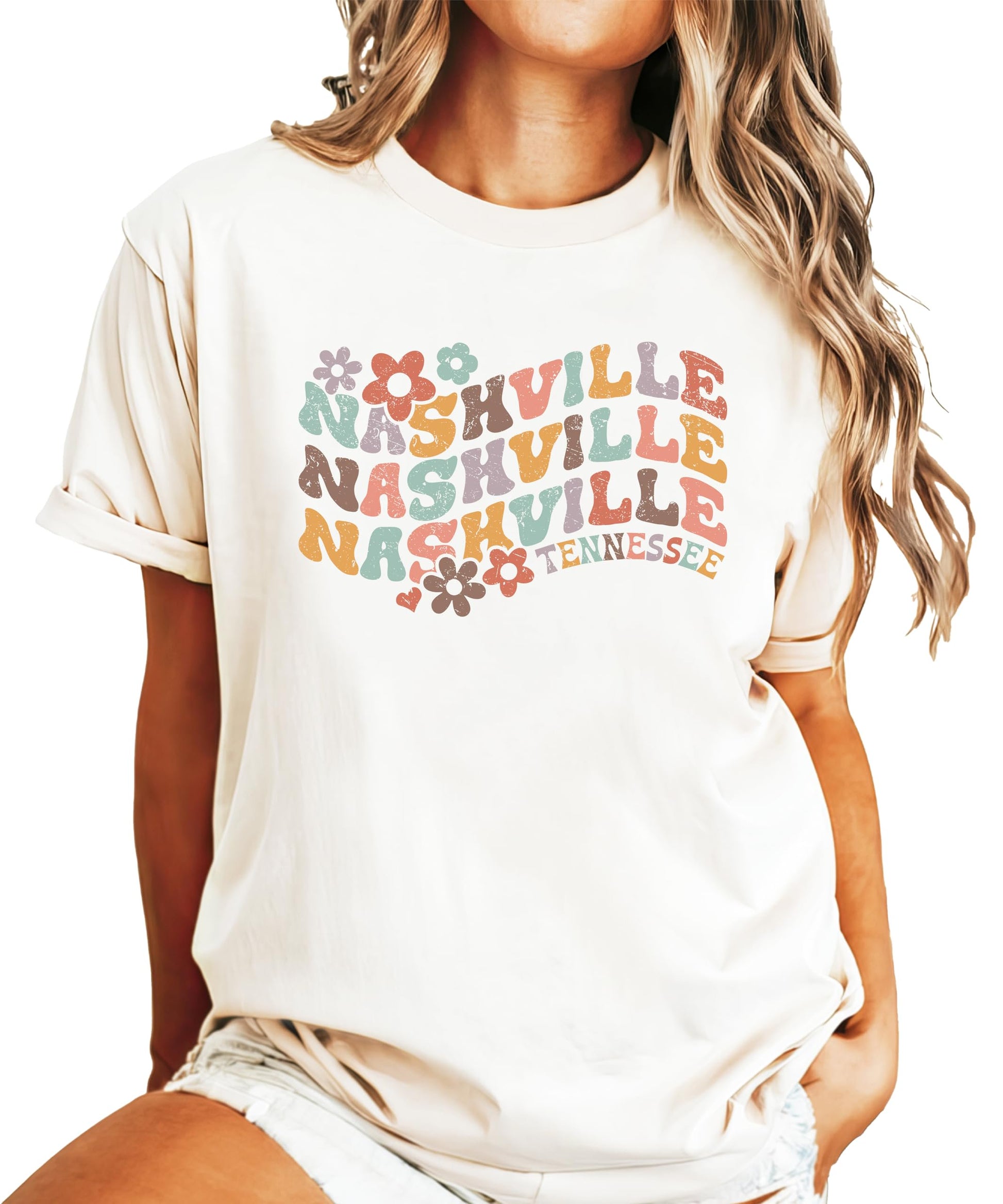 Kids and women's Nashville Tennessee colorful groovy graphic tee flat lay