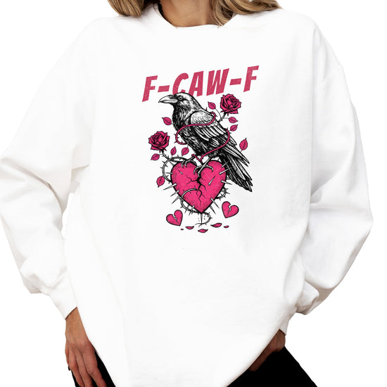 Detail shot of crow broken heart sweatshirt print quality on white fleece fabric