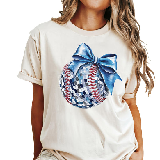 Close-up of disco softball and blue bow graphic print on soft oversized women's tee