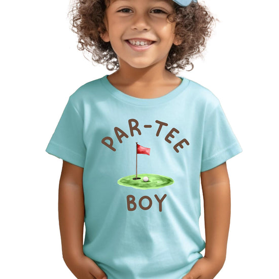 Boys golf birthday tee laid flat showing full graphic and natural fabric color