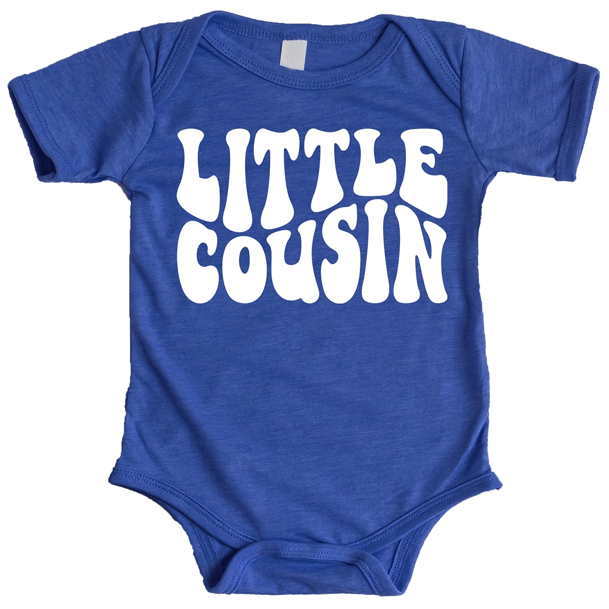Baby wearing Little Cousin bodysuit styled for family photo