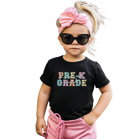 Black kids t-shirt with colorful Pre-K Grade text in bold pastel letters