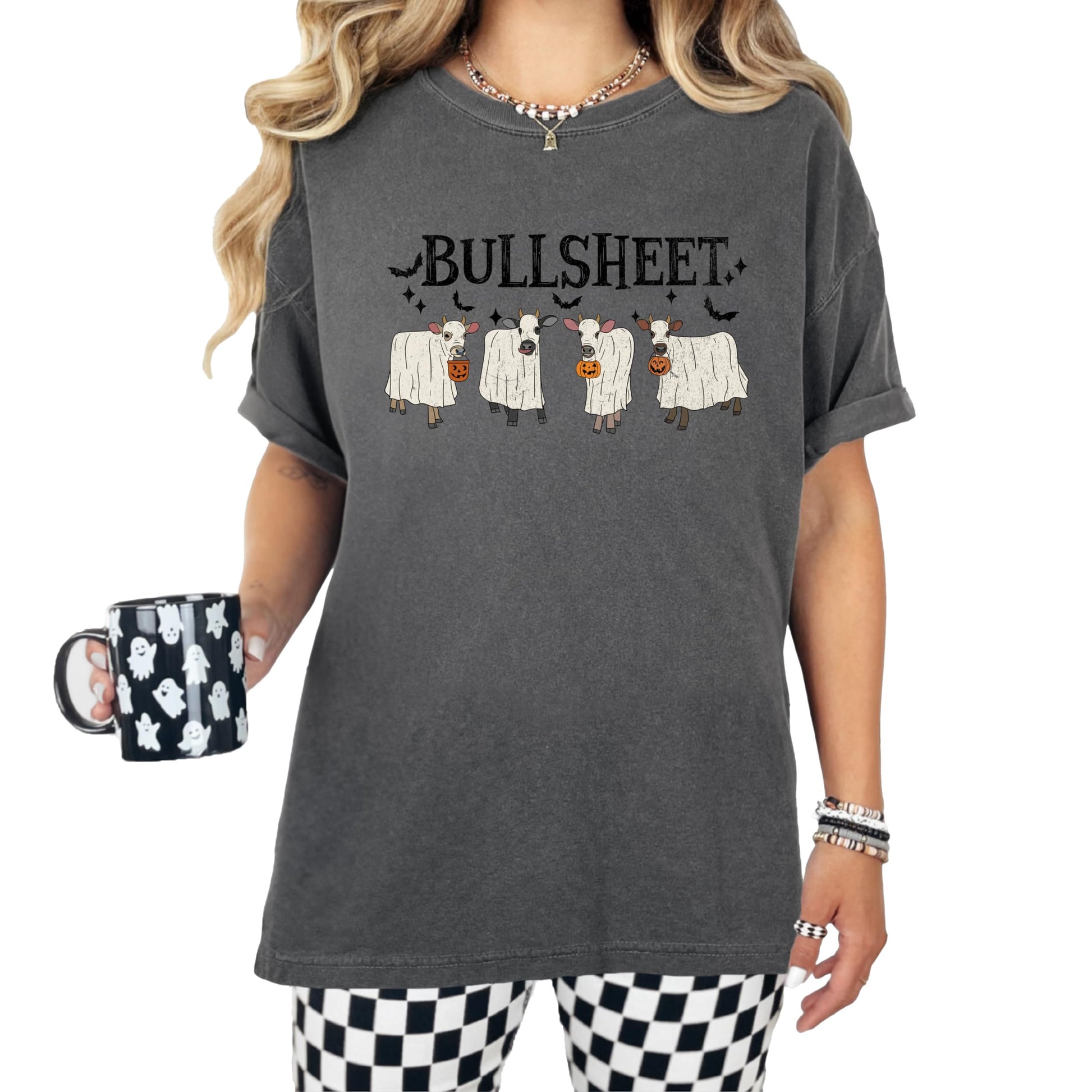 Detail shot of Bull Sheet ghost cow graphic print quality on seafoam shirt