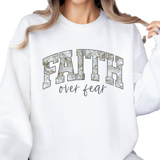 Faith Over Fear Christian sweatshirt styled for casual spring outfit