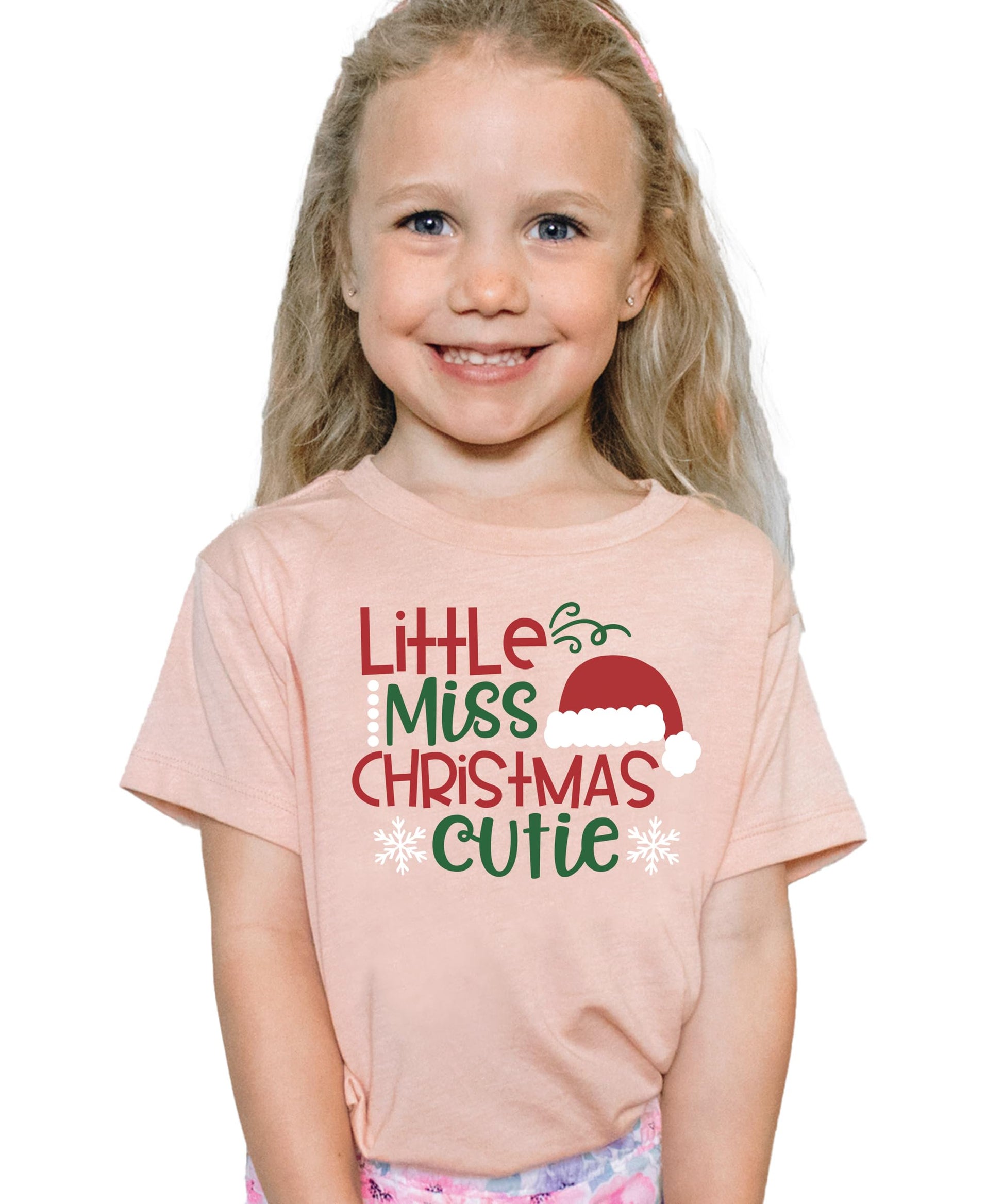 Little Miss Christmas Cutie kids tee in peach — perfect for family holiday photo outfits