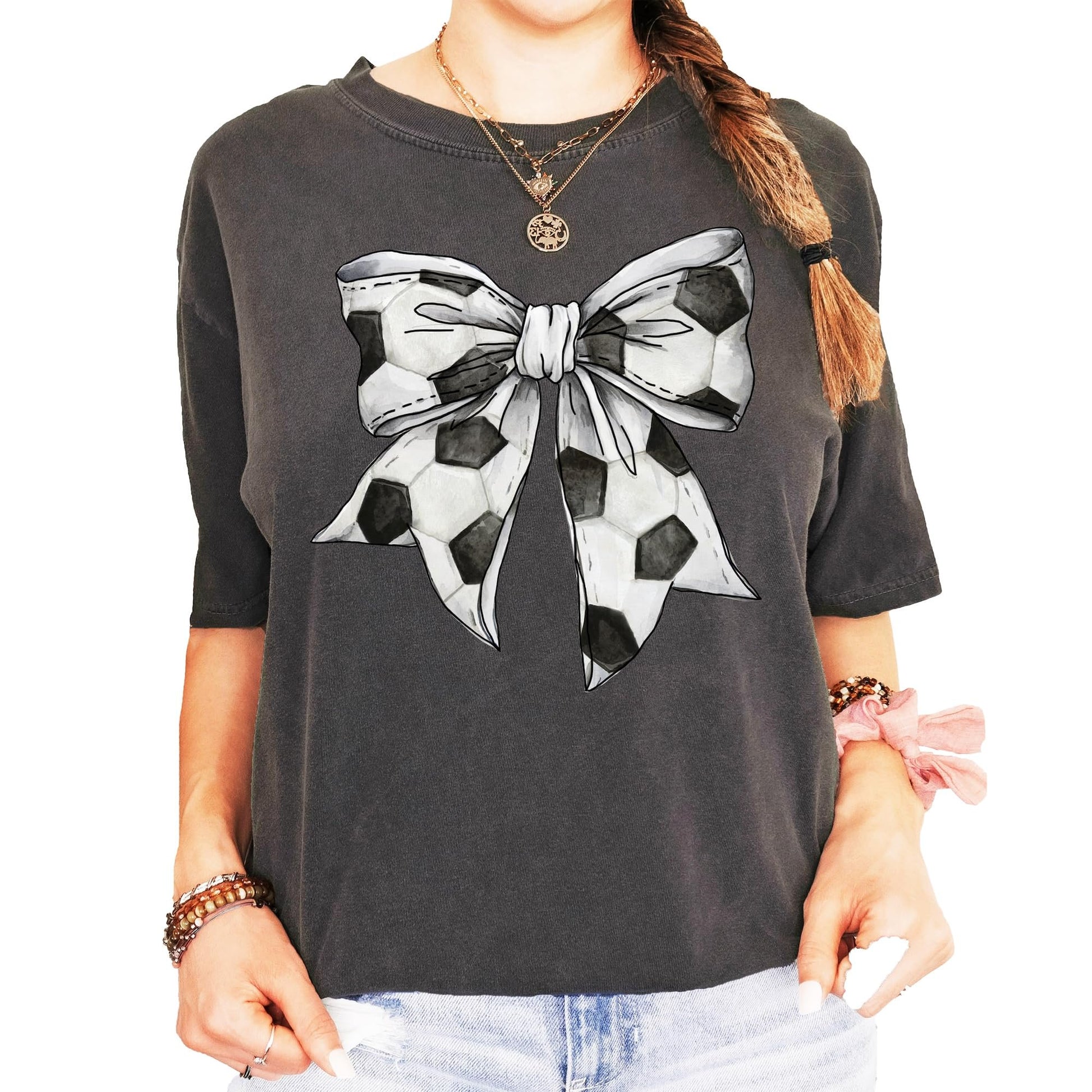 Women's oversized seafoam green soccer coquette bow graphic tee by Olive Loves Apple