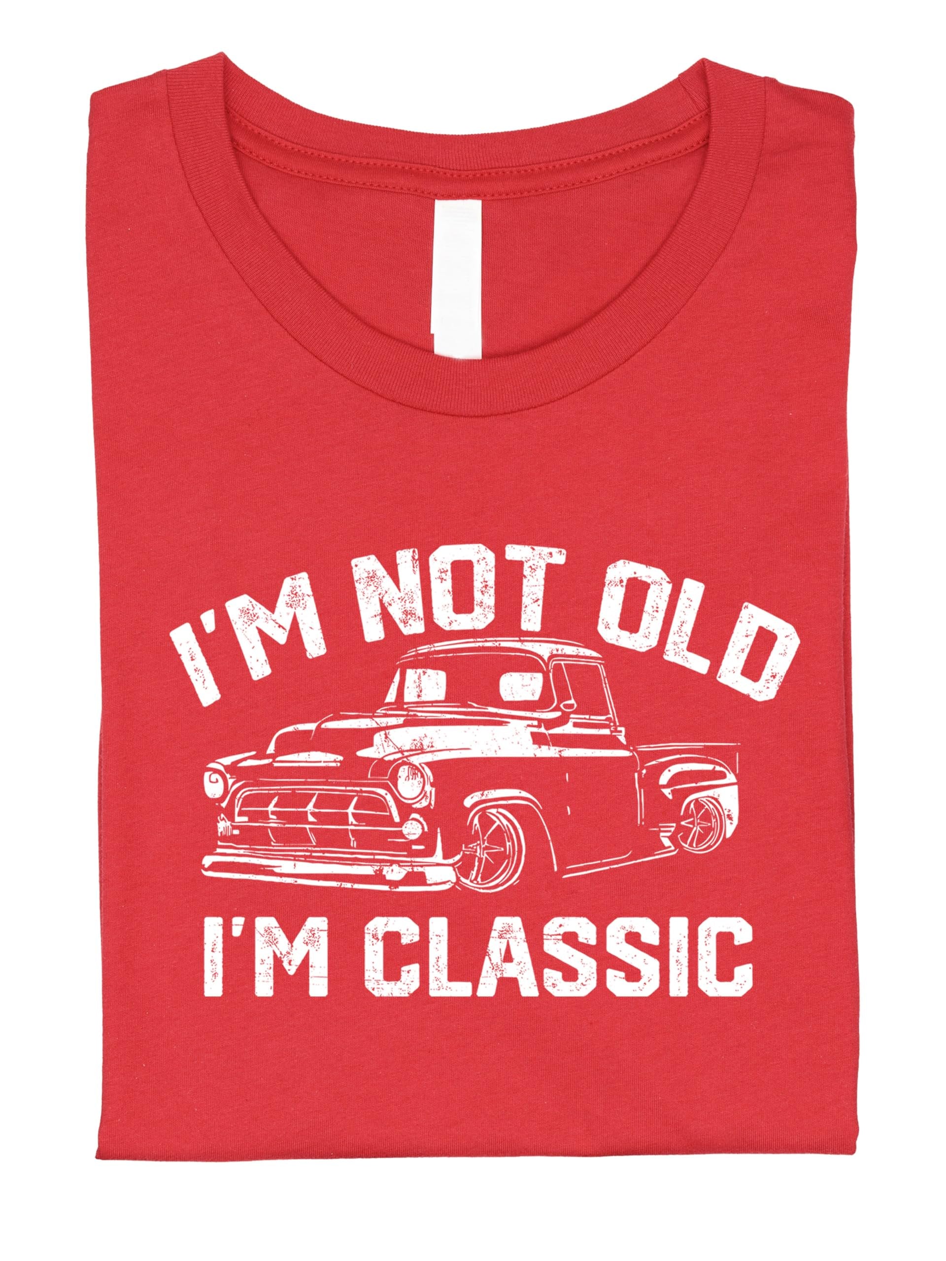 Men's black humor graphic tee flat lay showing full classic car design and slogan