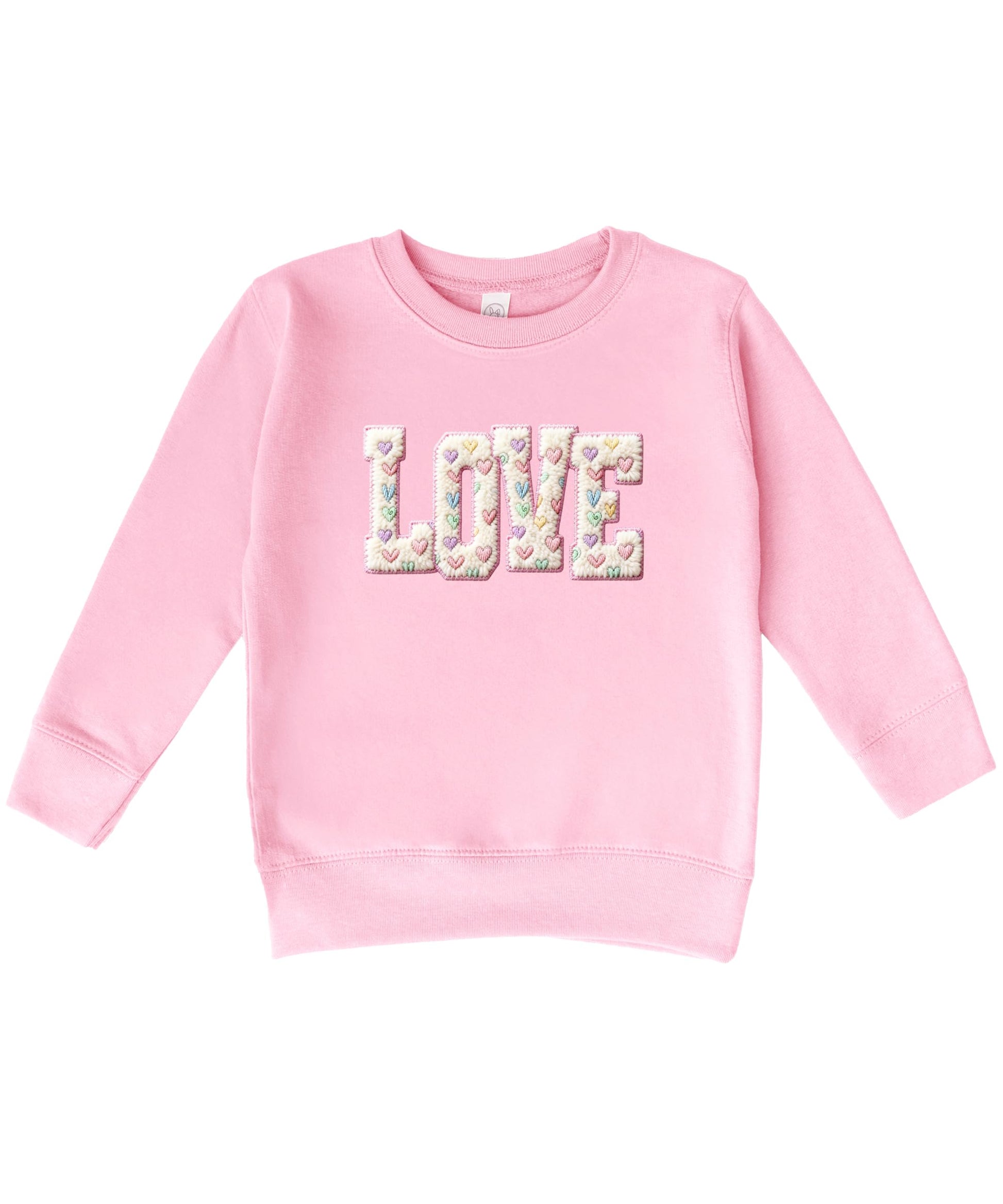 Close-up of ink-printed retro LOVE design with pastel hearts on pink sweatshirt