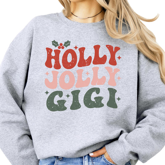 Close-up of Holly Jolly Gigi retro holiday graphic print on gray women's sweatshirt
