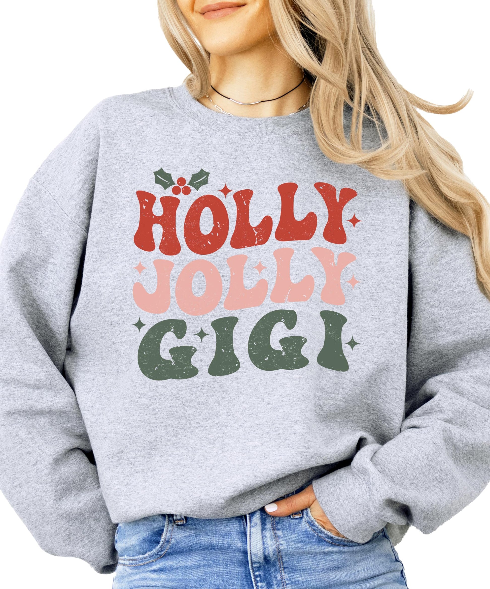 Close-up of Holly Jolly Gigi retro holiday graphic print on gray women's sweatshirt