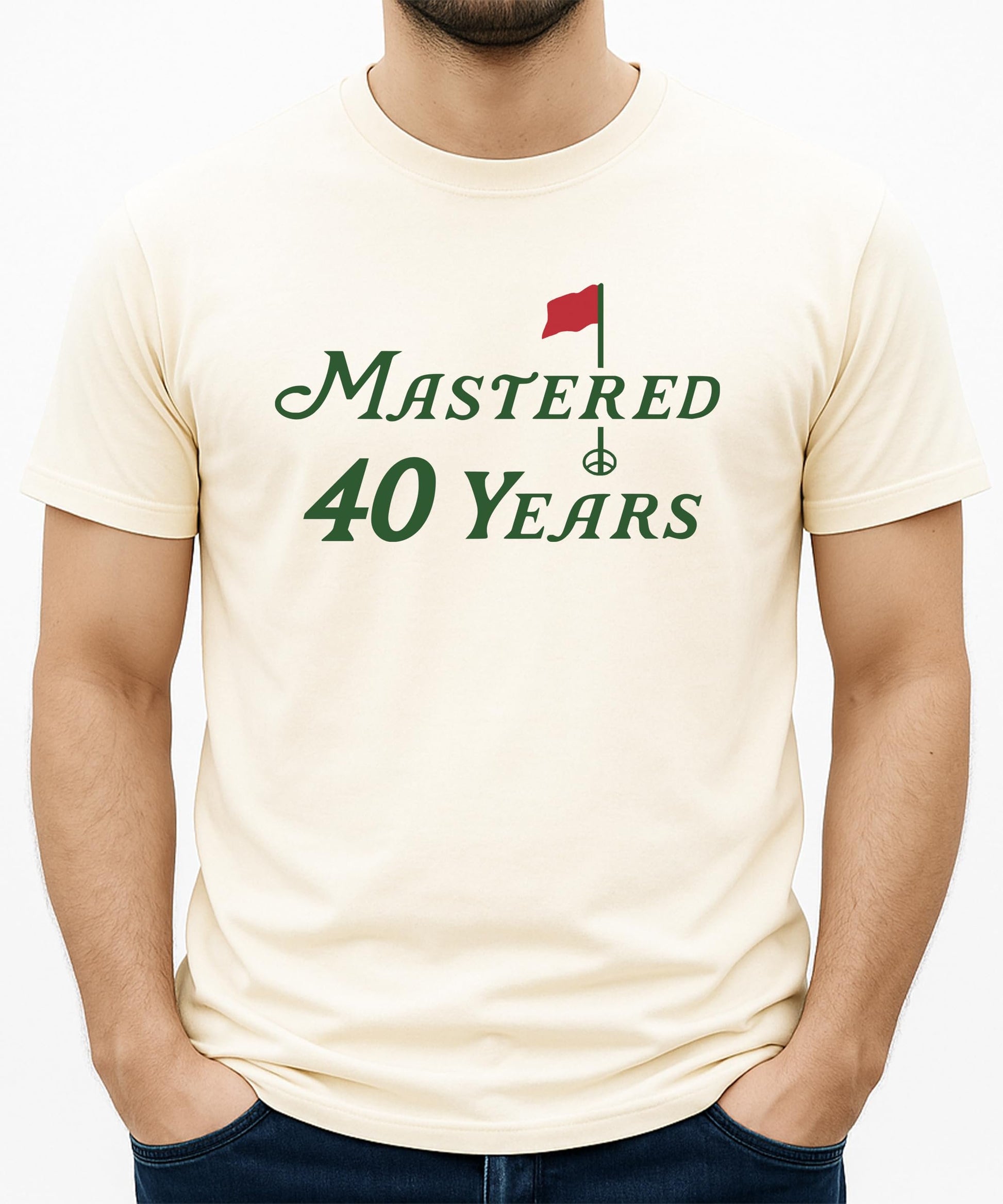 Close-up of Mastered 40 Years golf theme print on a vintage green unisex birthday t-shirt