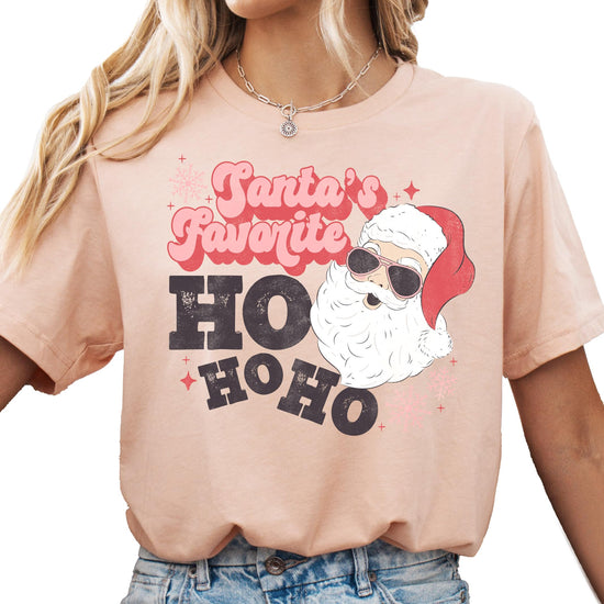 Flat lay of women's funny Santa Ho Ho Ho holiday graphic tee showing full print detail