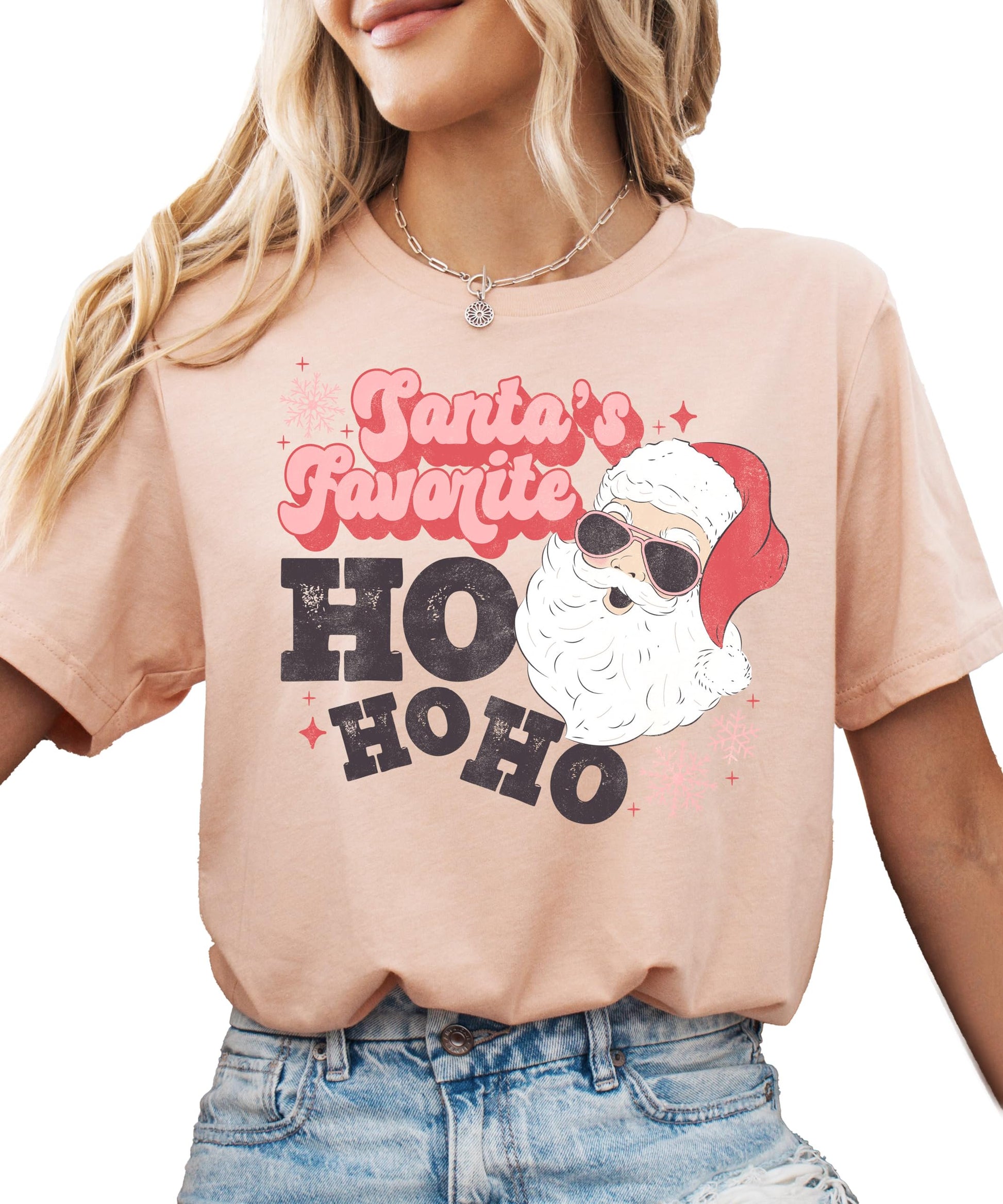 Flat lay of women's funny Santa Ho Ho Ho holiday graphic tee showing full print detail