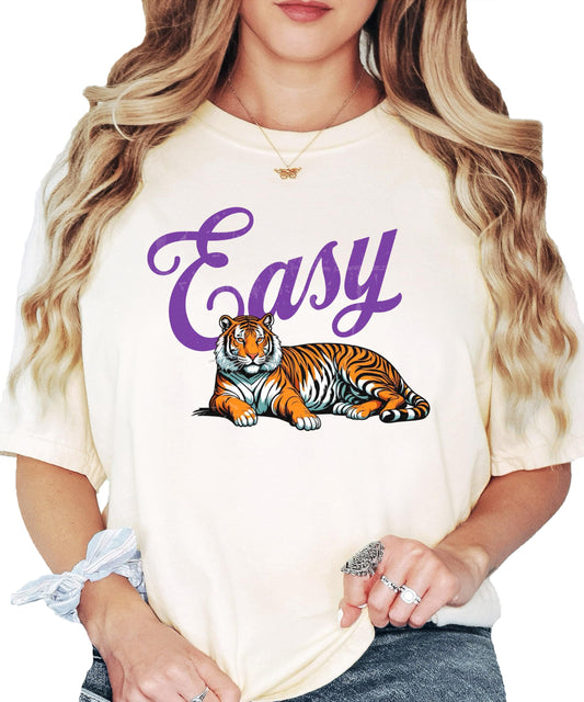 Close-up of Easy Tiger graphic tee showing purple text and tiger illustration on soft ivory fabric