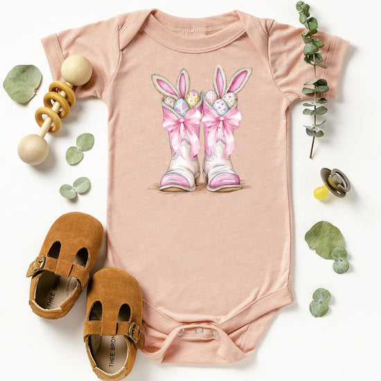 Full product shot of pink western Easter baby bodysuit for girls newborn to 12 months