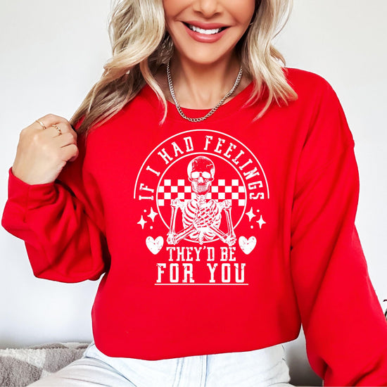 Close-up of If I Had Feelings They Would Be for You skeleton graphic print on red adult sweatshirt