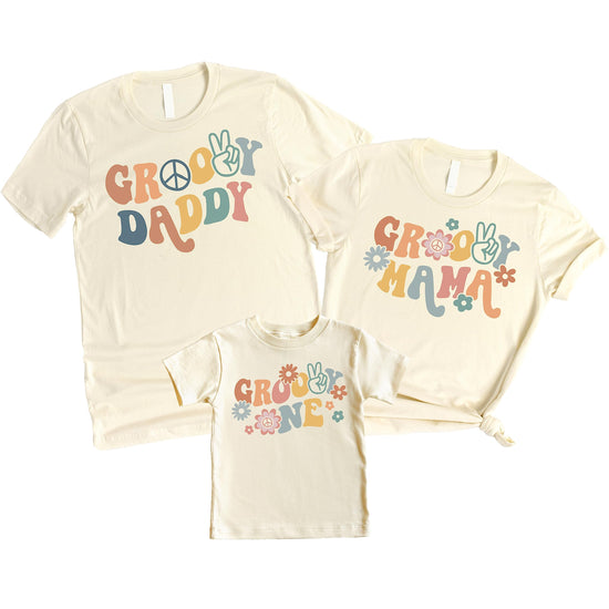 Adult and child wearing matching groovy birthday tees at a birthday party